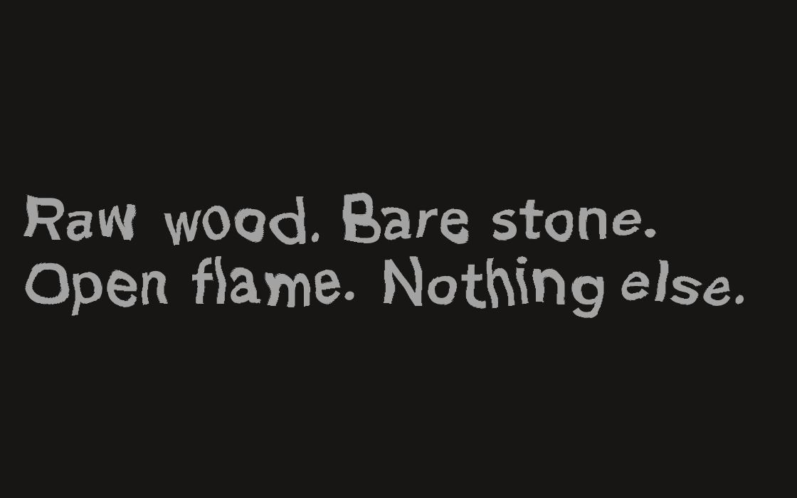 Open flame with rising sparks in the dark